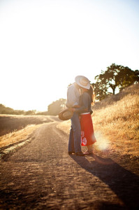 Borges_Couple_cowboy_hats_kiss_Lovelight_photo